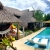 [Image: ¡Escapada Perfecta a la Playa! ¡Paga Q365 en Vez de Q850 por 1 Noche para 2 Personas en Cabaña Tipo Hawaii con Baño Privado o Habitaciones Dobles con Baño Privado + Uso de Instalaciones: Piscina, Hamacas y Más!m]