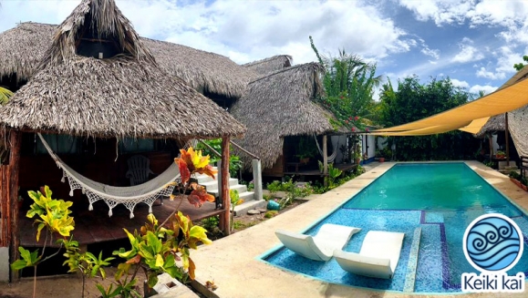 [Image: ¡Escapada Perfecta a la Playa! ¡Paga Q365 en Vez de Q850 por 1 Noche para 2 Personas en Cabaña Tipo Hawaii con Baño Privado o Habitaciones Dobles con Baño Privado + Uso de Instalaciones: Piscina, Hamacas y Más!m]