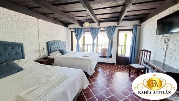 [Image: ¡Inolvidable Estadía en Atitlán! ¡Paga Q350 en Lugar de Q650 por Estadía para 2 Personas en Habitación Doble + Uso de Piscina, Vista al Lago y Volcanes, Acceso a Playa Privada y Área Verde + Impuestos Incluidos!m]