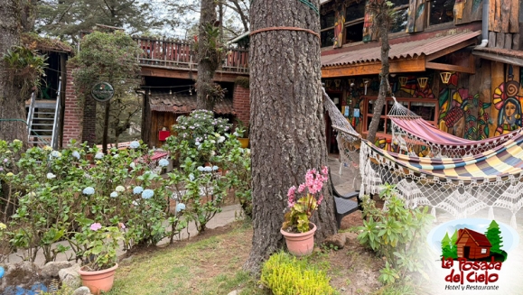 [Image: ¡Escapada con Clima Fresco! ¡Paga $37 en Lugar de $77 por Estadía de 1 Noche para 4 Personas en Habitación Doble + 2 Desayunos Típicos en Hotel y Restaurante La Posada del Cielo en Miramundo, Chalatenango!m]