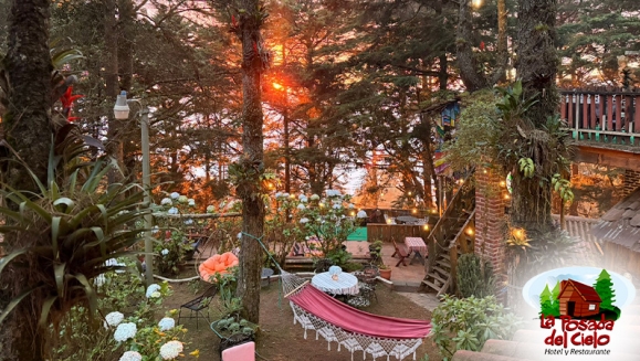 [Image: ¡Escapada con Clima Fresco! ¡Paga $37 en Lugar de $77 por Estadía de 1 Noche para 4 Personas en Habitación Doble + 2 Desayunos Típicos en Hotel y Restaurante La Posada del Cielo en Miramundo, Chalatenango!m]